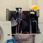 An open condenser; Monmouth County air conditioner repair in progress